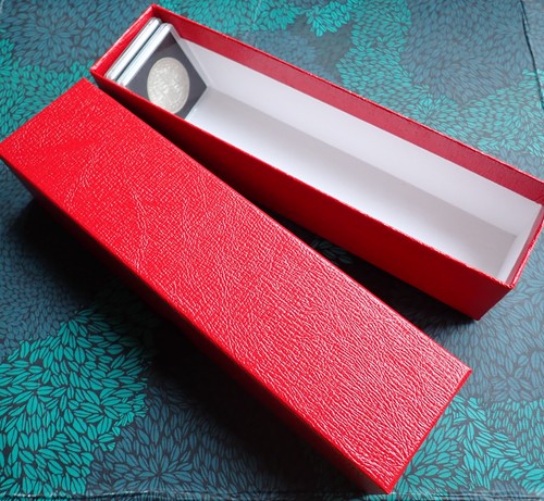 Red coin cardboard box by - 9",
