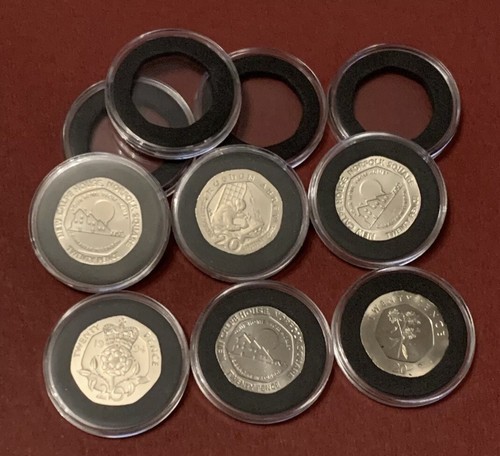 Coin capsule holder with - x,